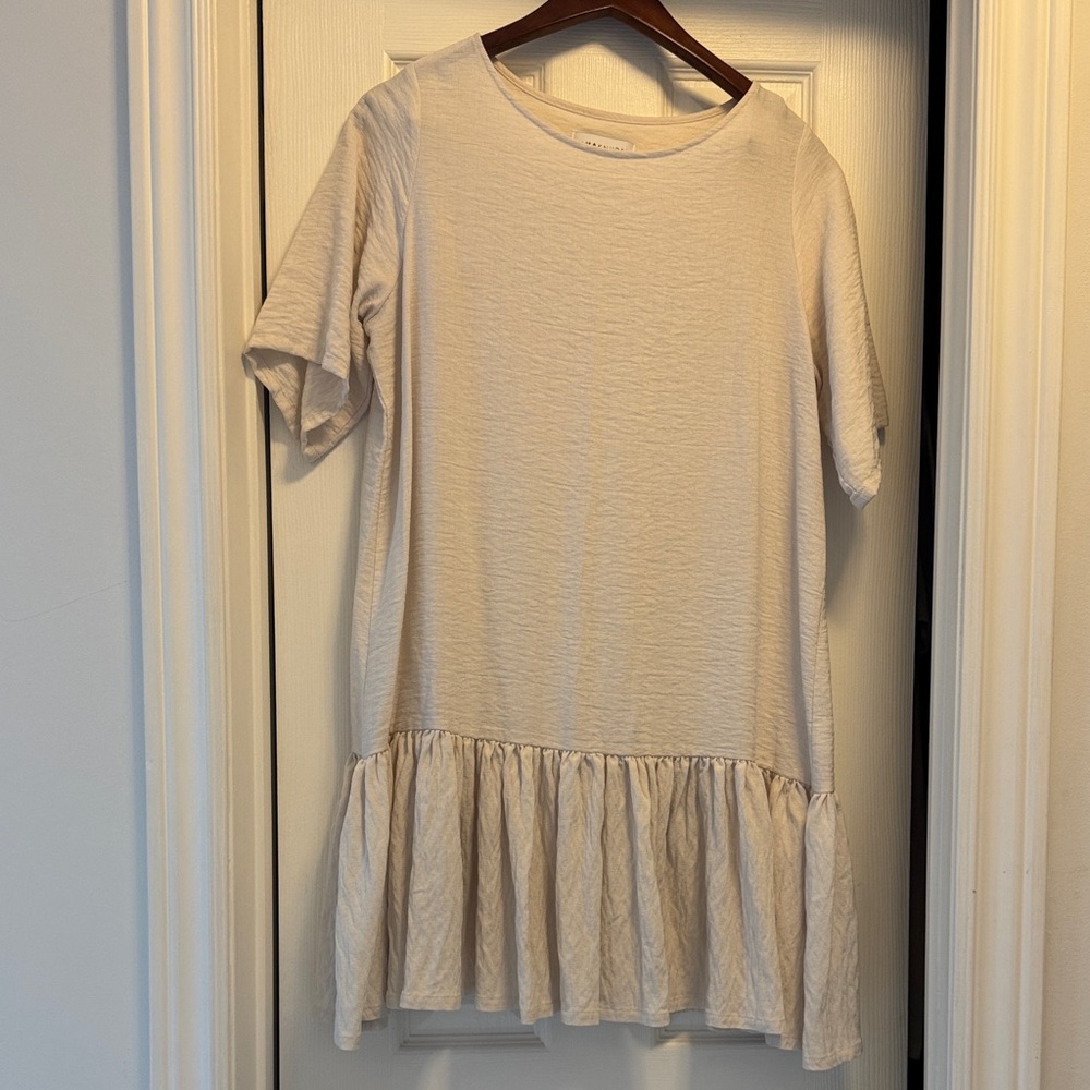 Elegant Cream Ruffle Hem Dress